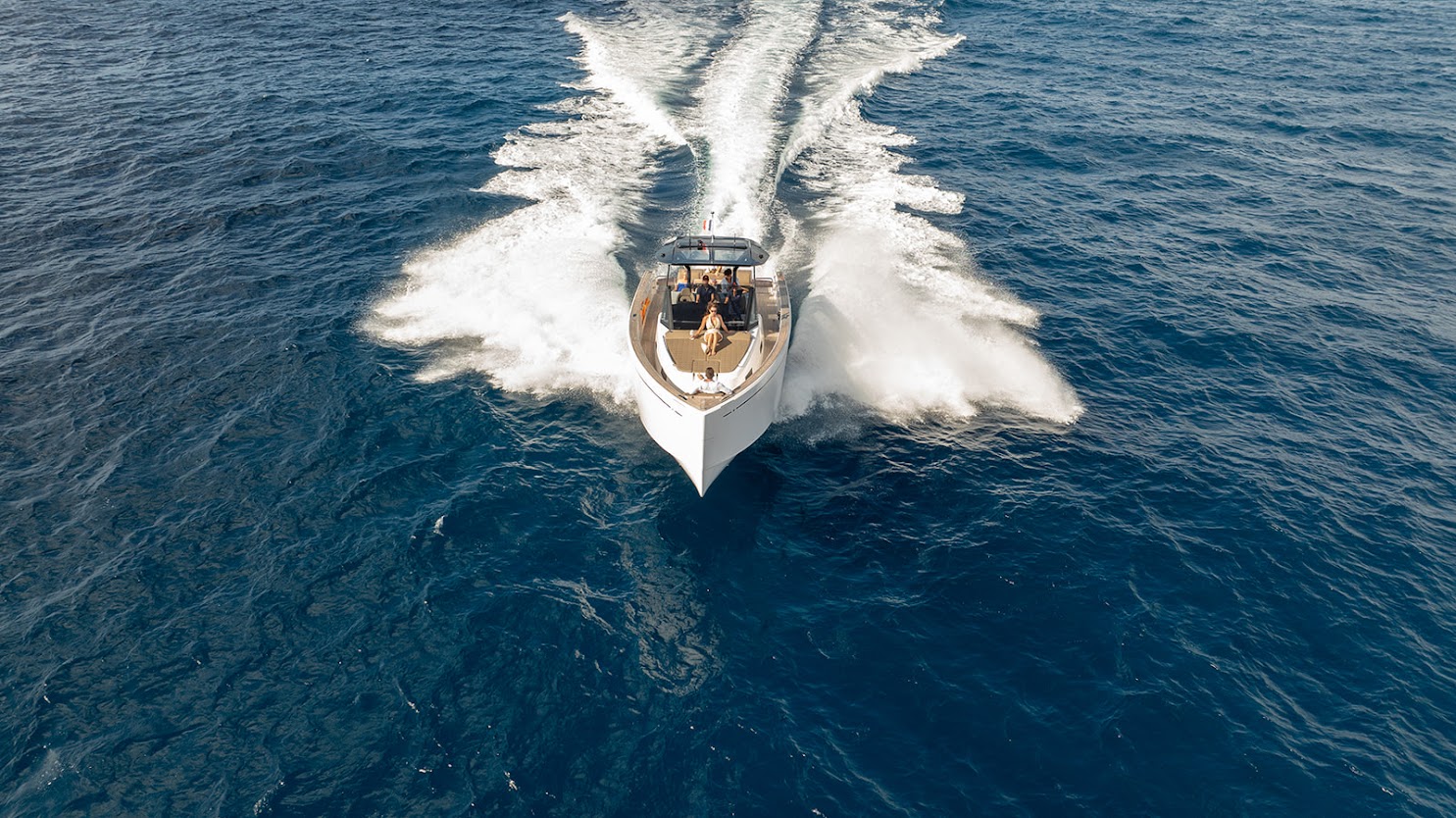 Aerial view of the Pardo 43 motor yacht cruising at speed on deep blue water